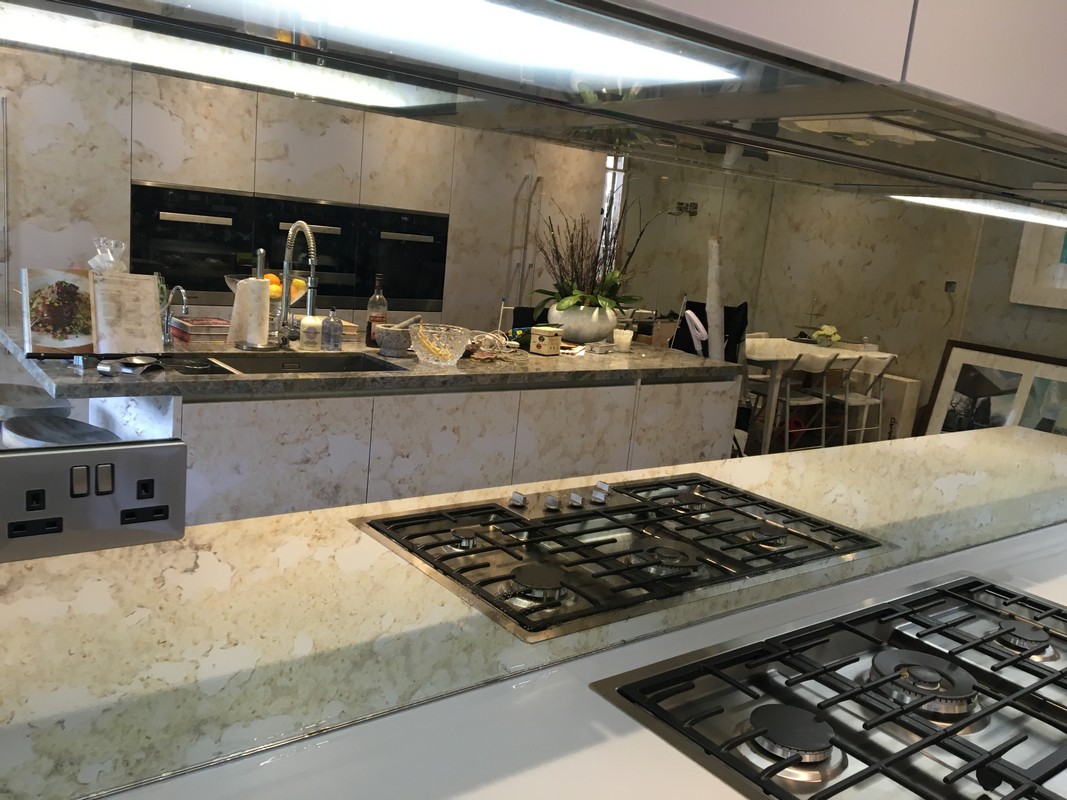 Mirror glass splashback in Crouch End luxury kitchen